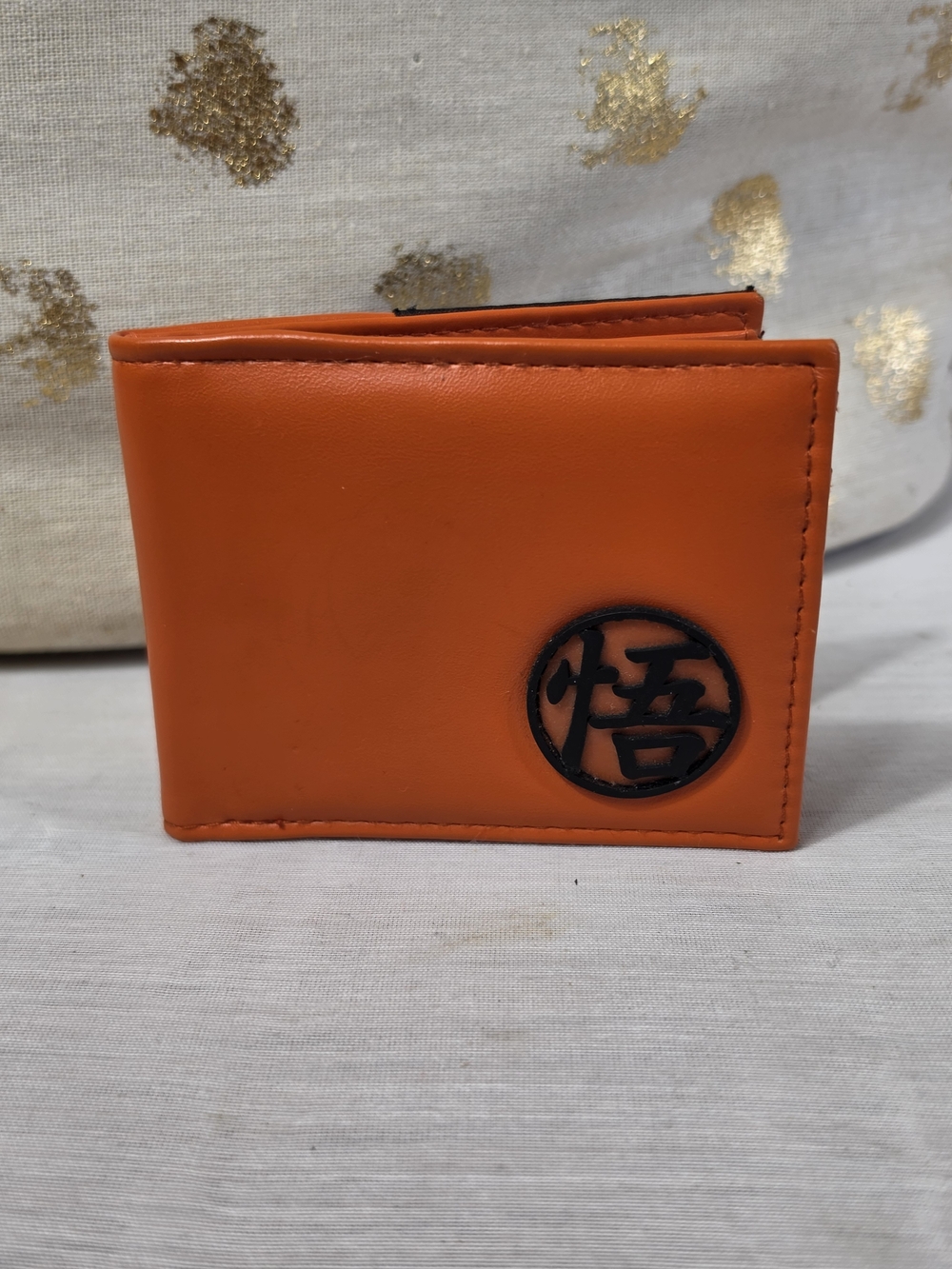 Orange Bi-Fold Key & Card Holder with Black Emblem Accent